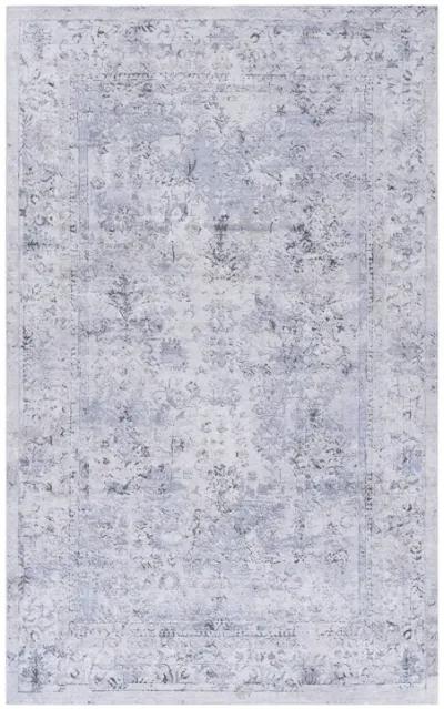 Colca 5' x 8' Blue/Cream Machine Washable Low-Pile, Non-Slip, Non-Shedding, Foldable, Kid & Pet Friendly Area Rug