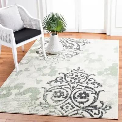 Adirondack Contemporary Ivory / Green 5'-5" X 7'-7" Powerloomed Rug