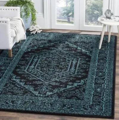 Adirondack Contemporary Black / Teal 6' X 9' Powerloomed Rug