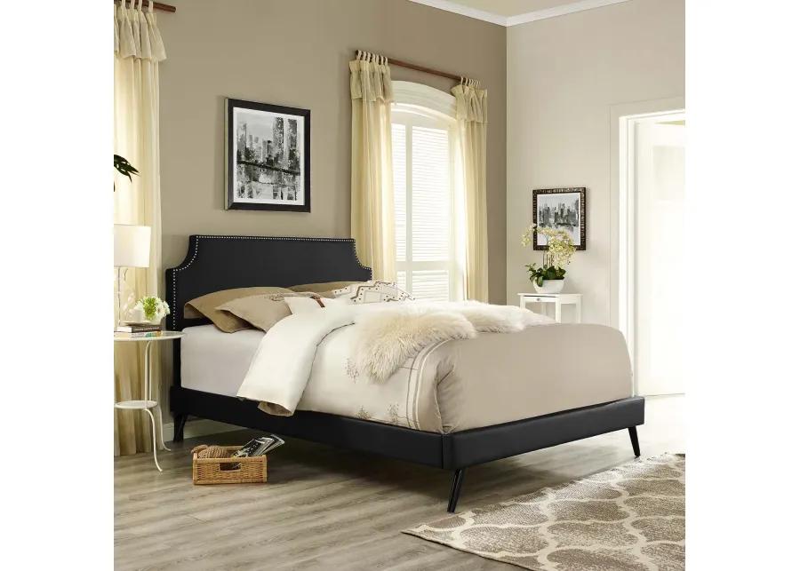 Corene Queen Vinyl Platform Bed with Round Splayed Legs