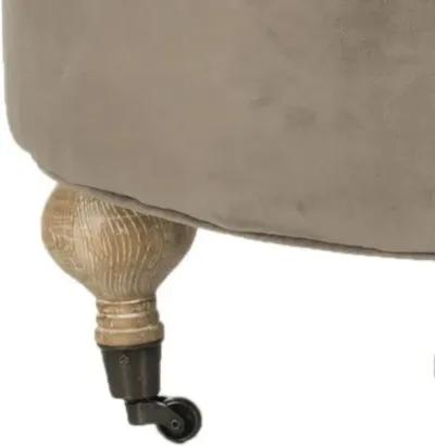 CLARA TUFTED ROUND OTTOMAN