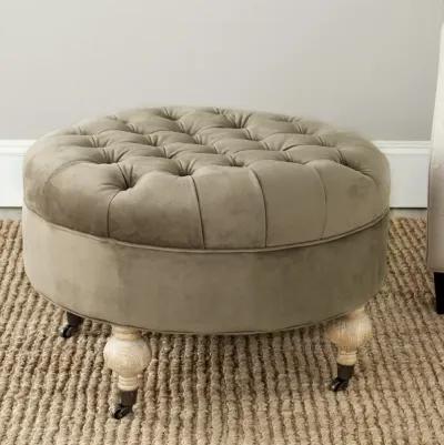 CLARA TUFTED ROUND OTTOMAN