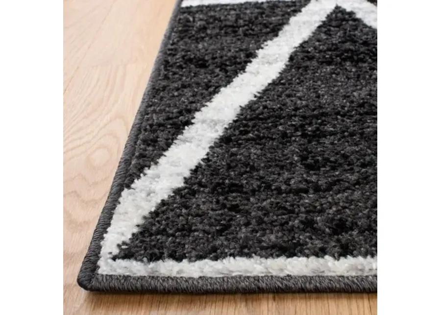 ADIRONDACK Contemporary Black / Ivory 2'-6" X 8' Powerloomed Rug