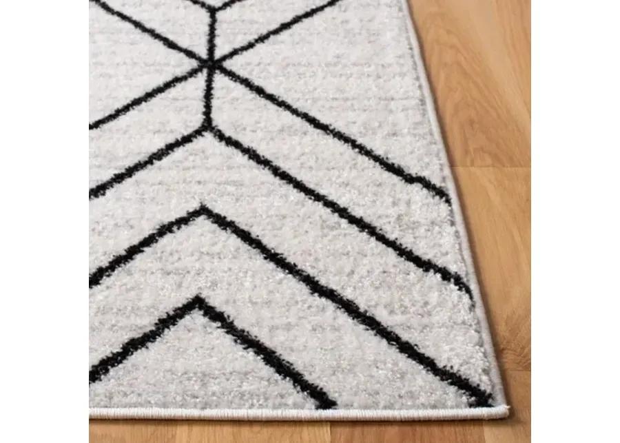 ADIRONDACK Contemporary Ivory / Black 2'-6" X 8' Powerloomed Rug