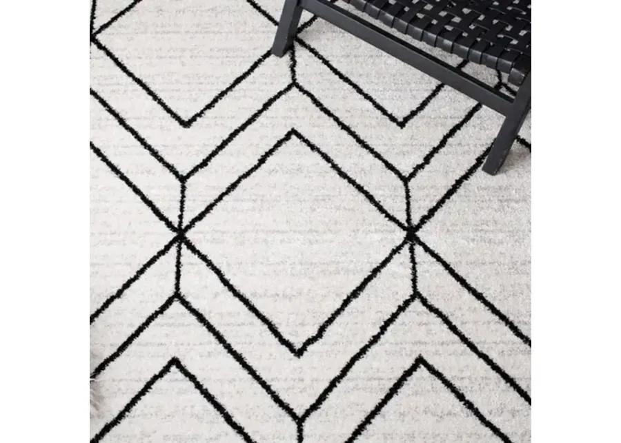 ADIRONDACK Contemporary Ivory / Black 2'-6" X 8' Powerloomed Rug