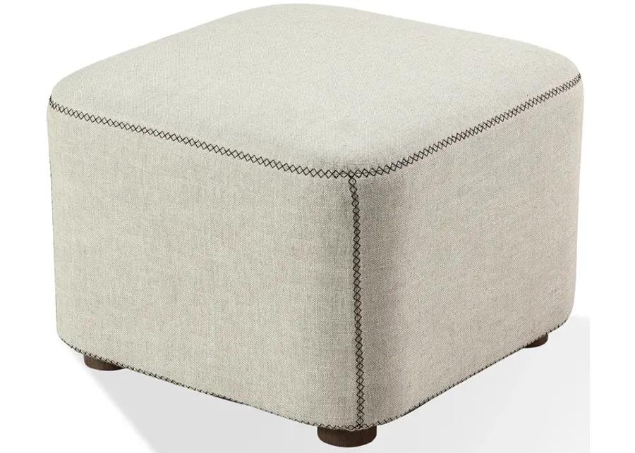 Louis Upholstered Ottoman in Natural Linen