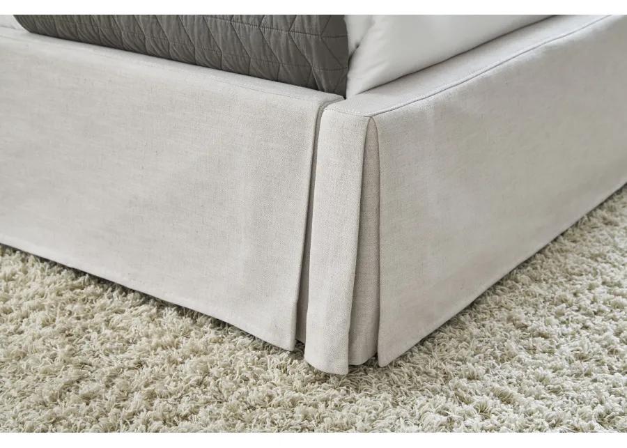 Hera California King-Size Upholstered Skirted Storage Panel Bed in Oatmeal