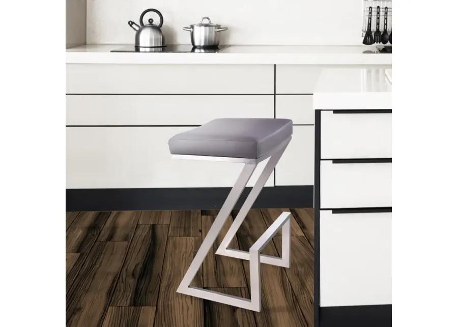 Atlantis 26" Counter Height Backless Grey Faux Leather and Brushed Stainless Steel Bar Stool