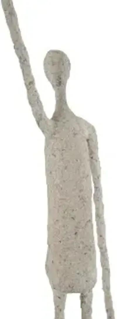 human sculpture, one arm up, paper mache