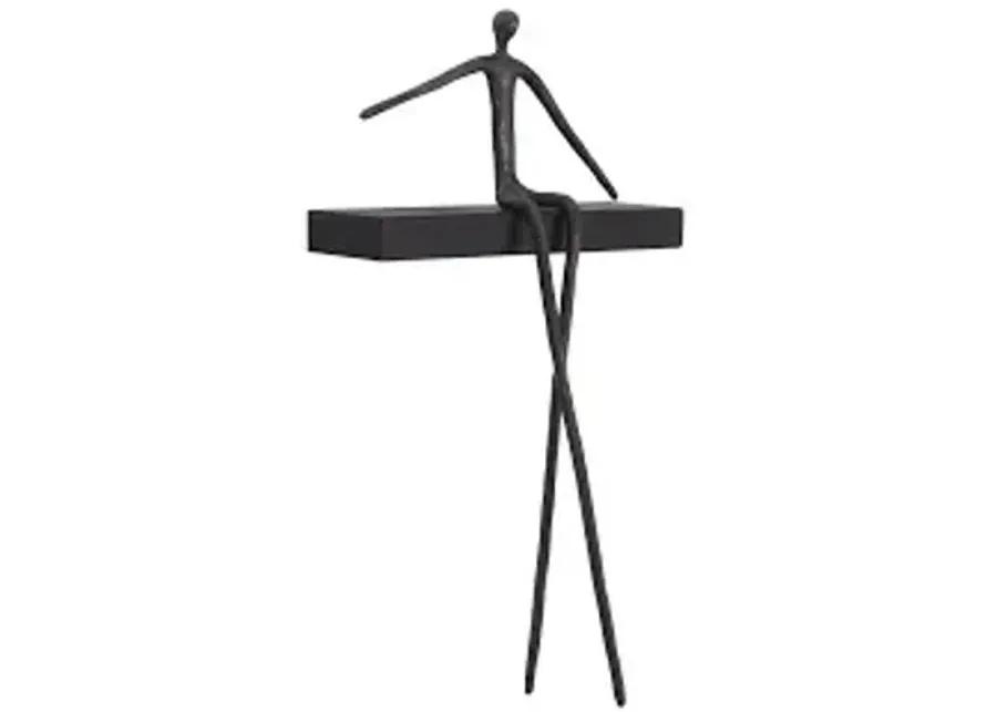 moveable man on short shelf, sitting, c