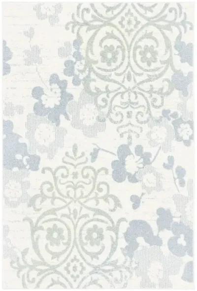 Adirondack Contemporary Ivory / Blue 4'-5" x 6'-5" Powerloomed Rug