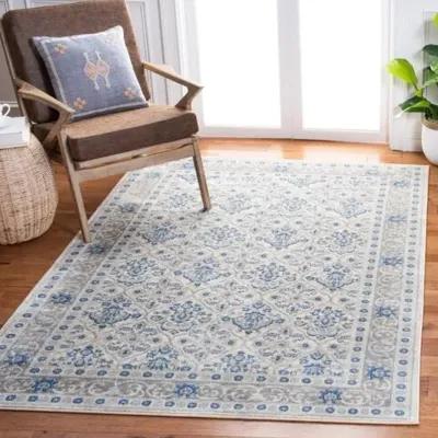 Brentwood 870 Ivory / Blue 5'-3" X 7'-6" Medium Rectangle Powerloomed Rug