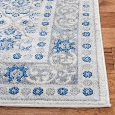 Brentwood 870 Ivory / Blue 5'-3" X 7'-6" Medium Rectangle Powerloomed Rug