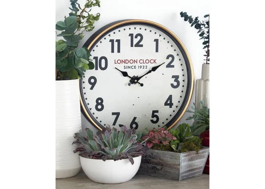 Ivy Collection Lubic Wall Clock in White by UMA Enterprises
