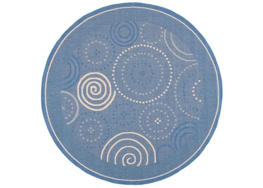 Courtyard Circles Indoor/Outdoor Area Rug Round in Blue & Natural by Safavieh