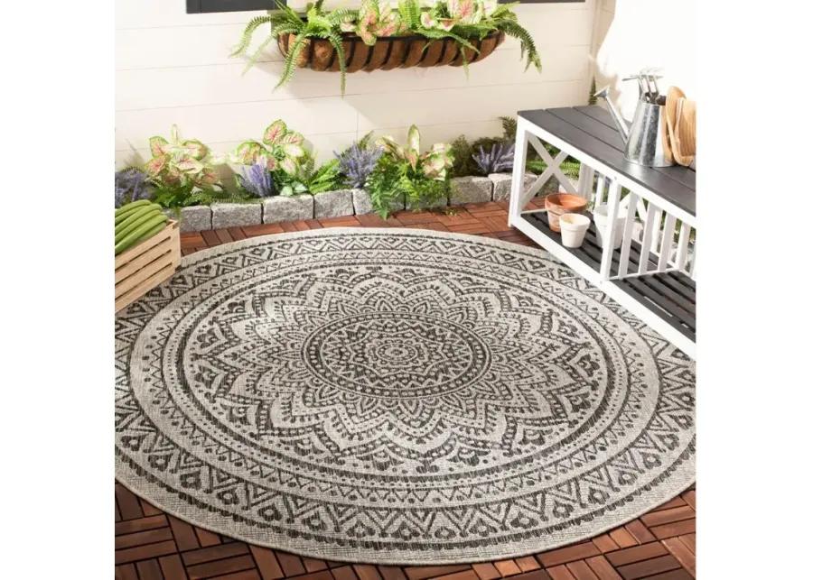 Courtyard Mandala Indoor/Outdoor Area Rug Round in Light Gray & Black by Safavieh