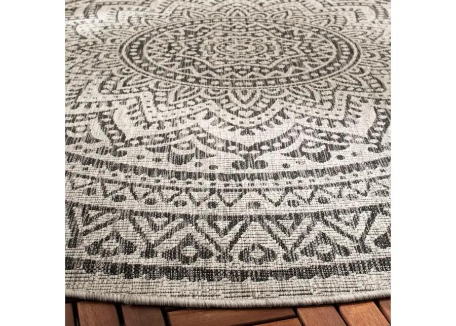 Courtyard Mandala Indoor/Outdoor Area Rug Round in Light Gray & Black by Safavieh