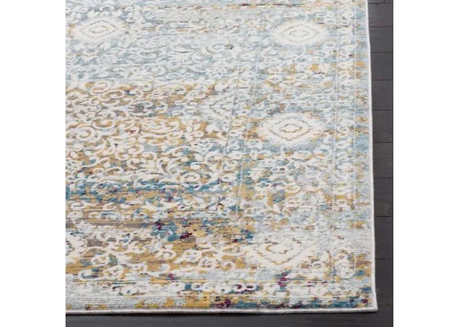 Alwine Area Rug in Yellow / Cream by Safavieh