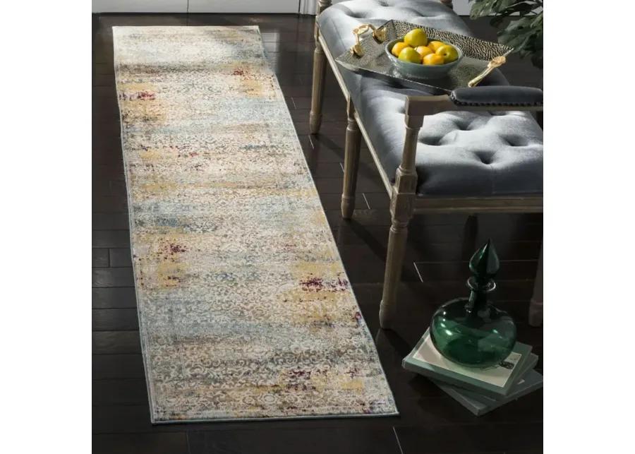 Alwine Area Rug in Yellow / Cream by Safavieh