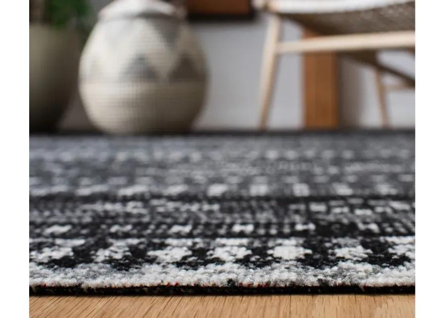 Montage III Area Rug in Gray & Black by Safavieh