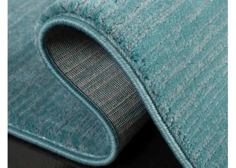 Ponzio Area Rug in Aqua by Safavieh