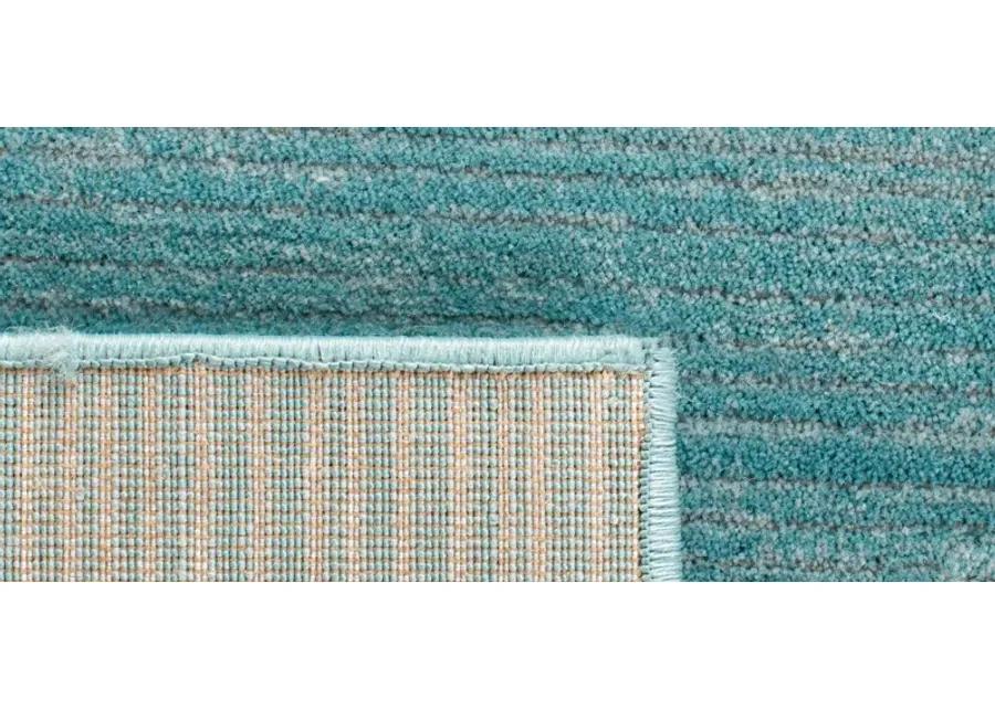 Ponzio Area Rug in Aqua by Safavieh