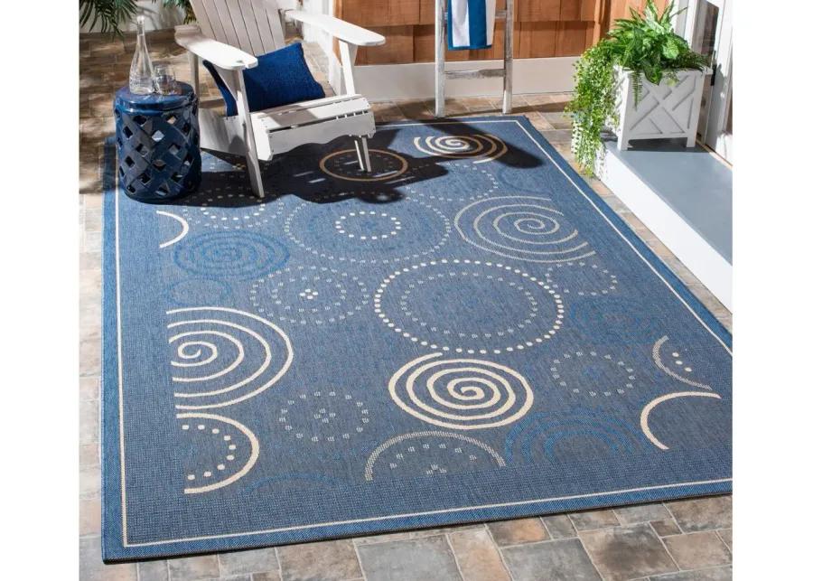 Courtyard Circles Indoor/Outdoor Area Rug in Blue & Natural by Safavieh