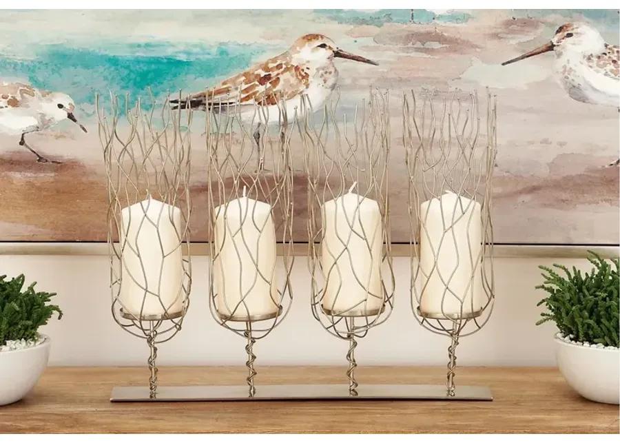 Ivy Collection Gnaeus Candle Holder in Silver by UMA Enterprises