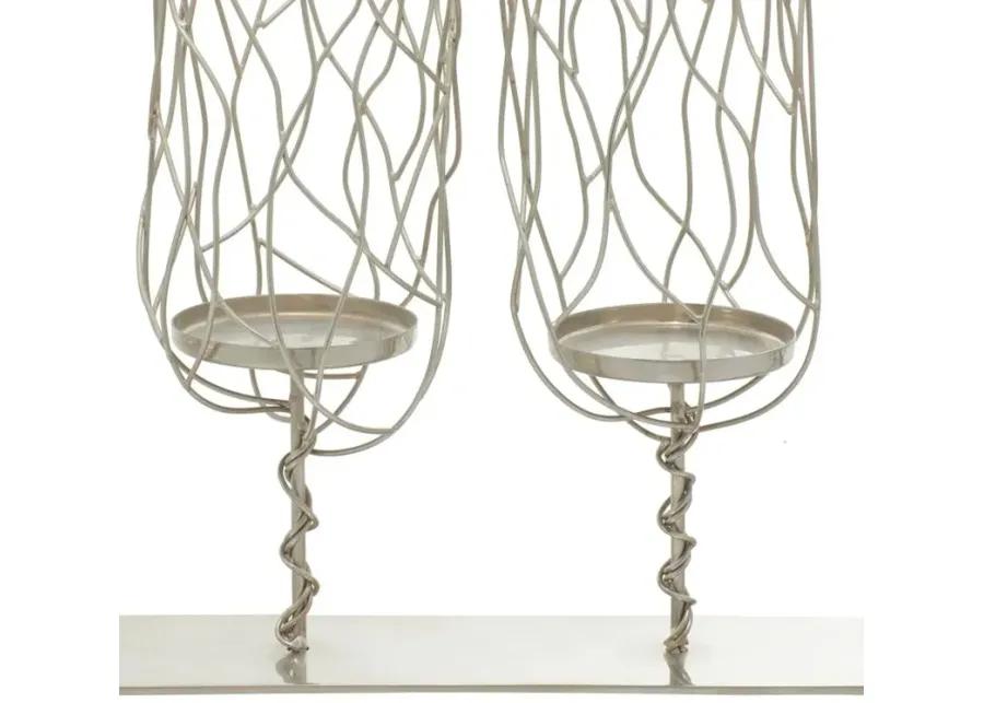 Ivy Collection Gnaeus Candle Holder in Silver by UMA Enterprises