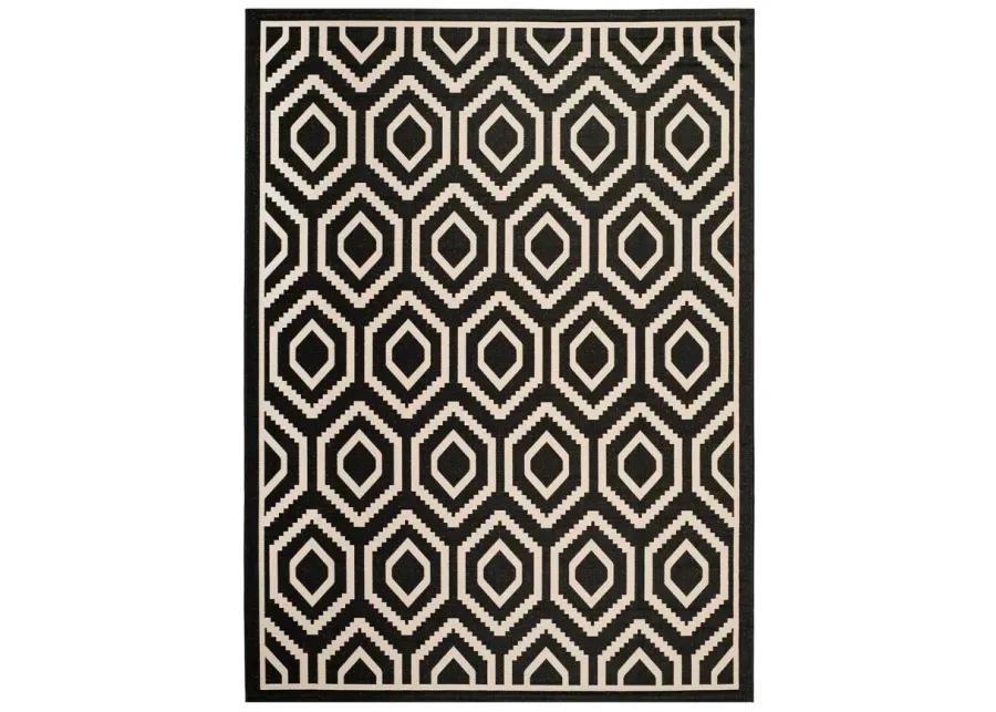 Courtyard Diamonds Indoor/Outdoor Area Rug in Black & Beige by Safavieh