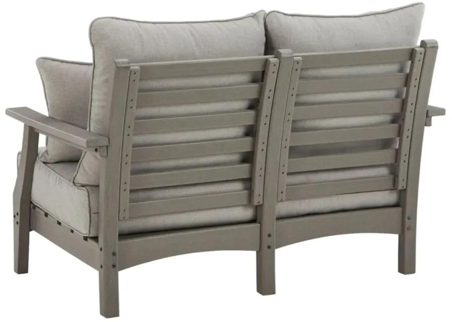 Visola Outdoor Loveseat in Natural by Ashley Furniture