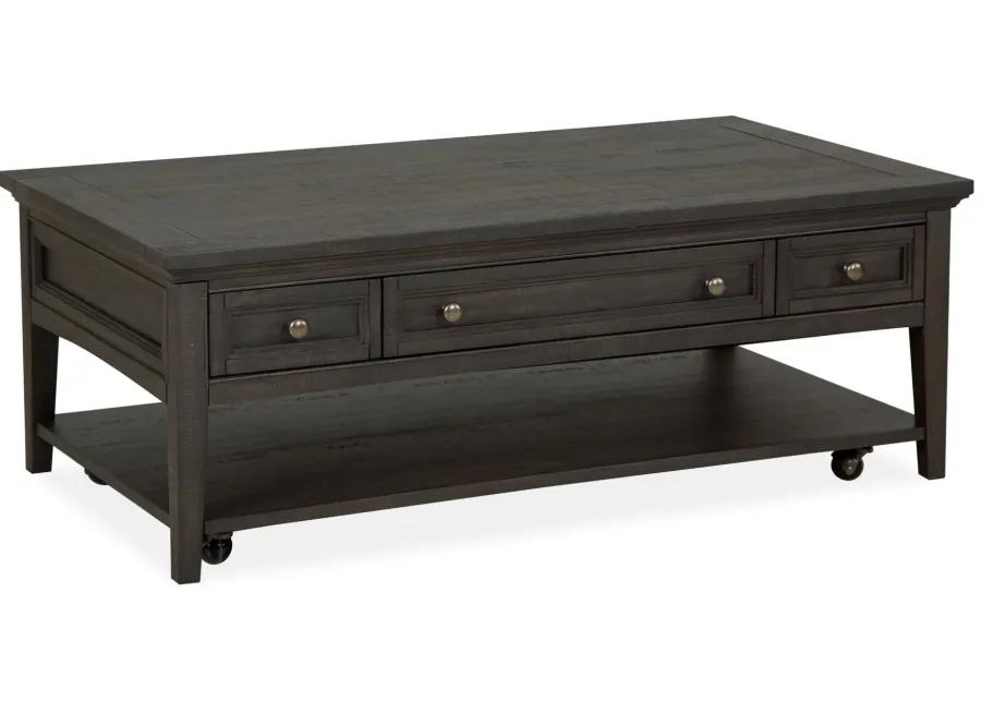 Westley Falls Rectangular Coffee Table w/ Casters in Graphite by Magnussen Home