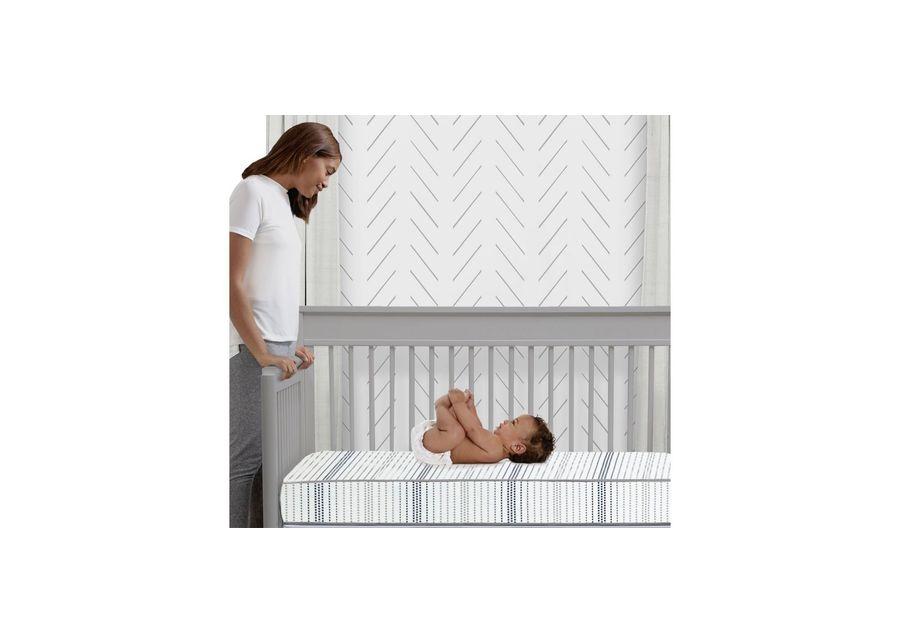 Serta iComfort Moonlight Breeze 2-Stage Plant-Based Foam Crib and Toddler Mattress by Delta Children in White by Delta Children