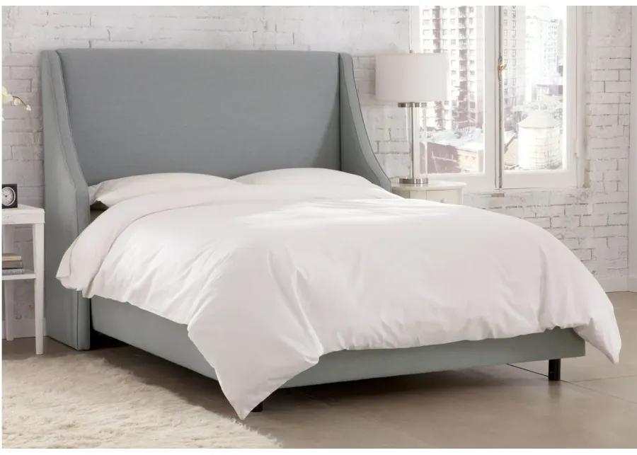 Cam Wingback Bed in Linen Gray by Skyline